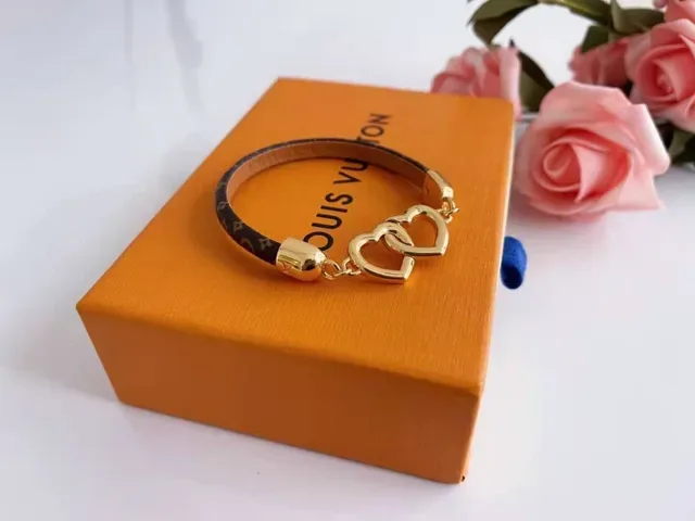 Gold-Tone Interlocking Heart Charm Bracelet 4