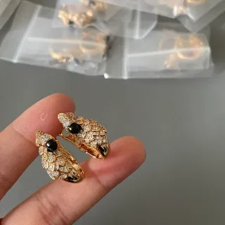 Gold-Tone Pavé Crystal and Black Cabochon Scale Motif Hinged Hoop Earrings