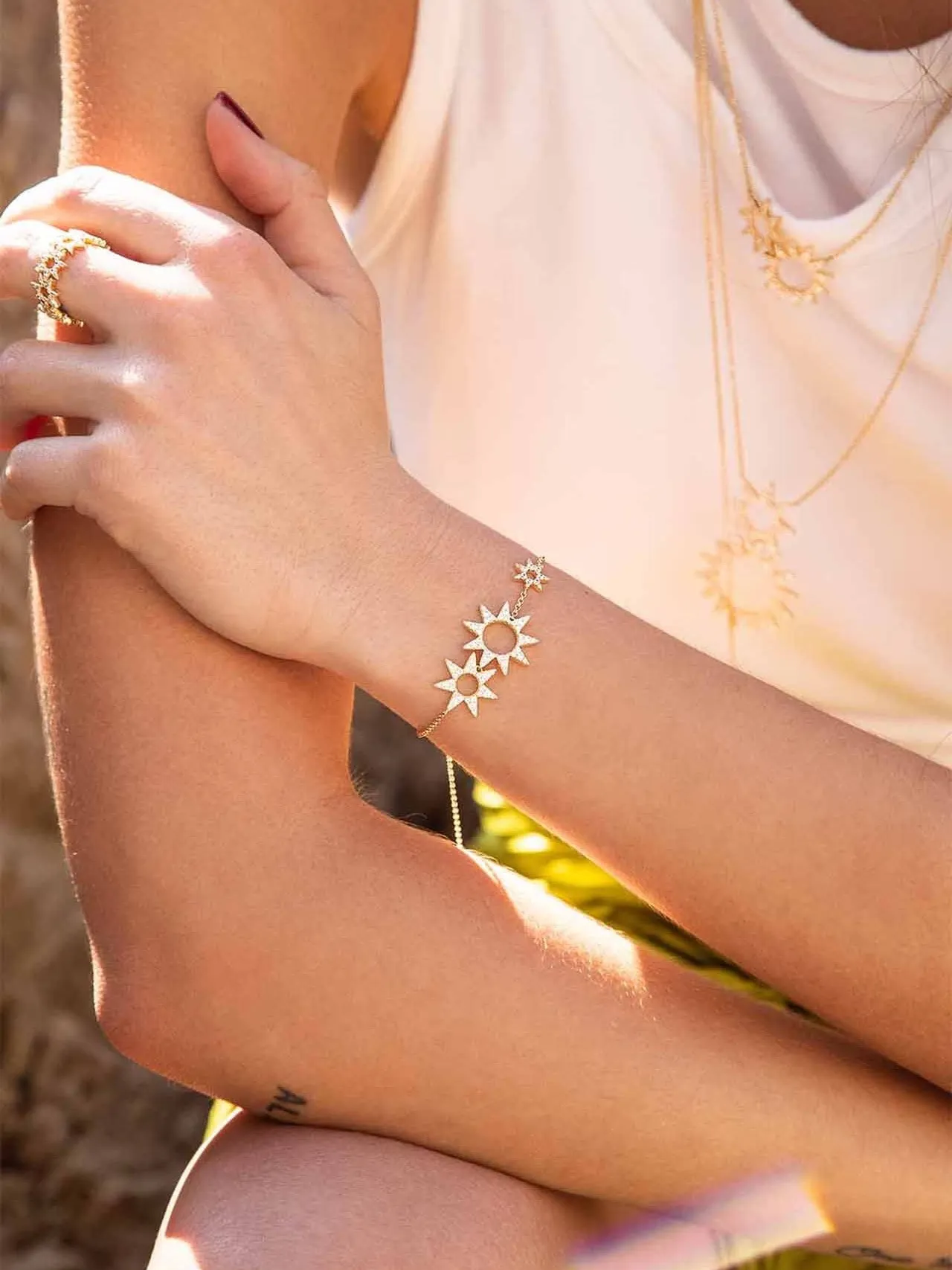 Bracelet en chaîne avec motif étoile éclatante en ton doré 3