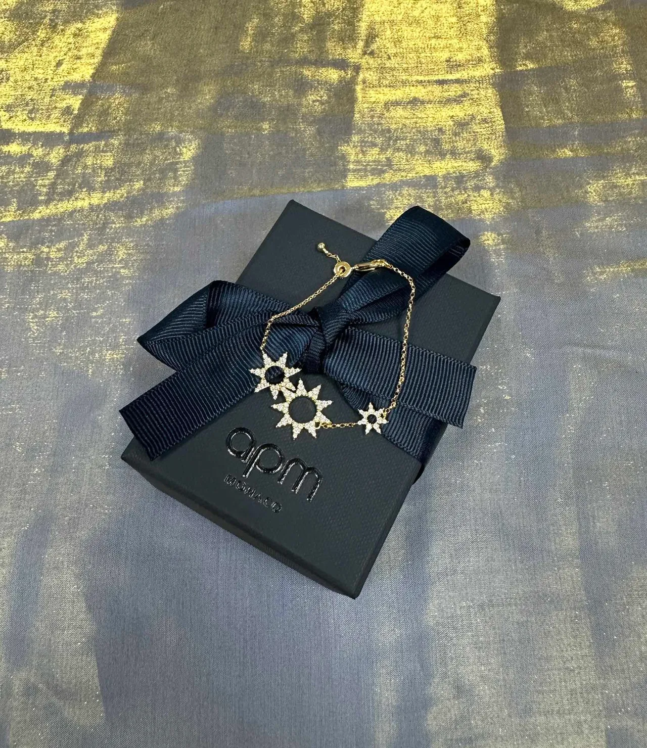 Bracelet en chaîne avec motif étoile éclatante en ton doré 5