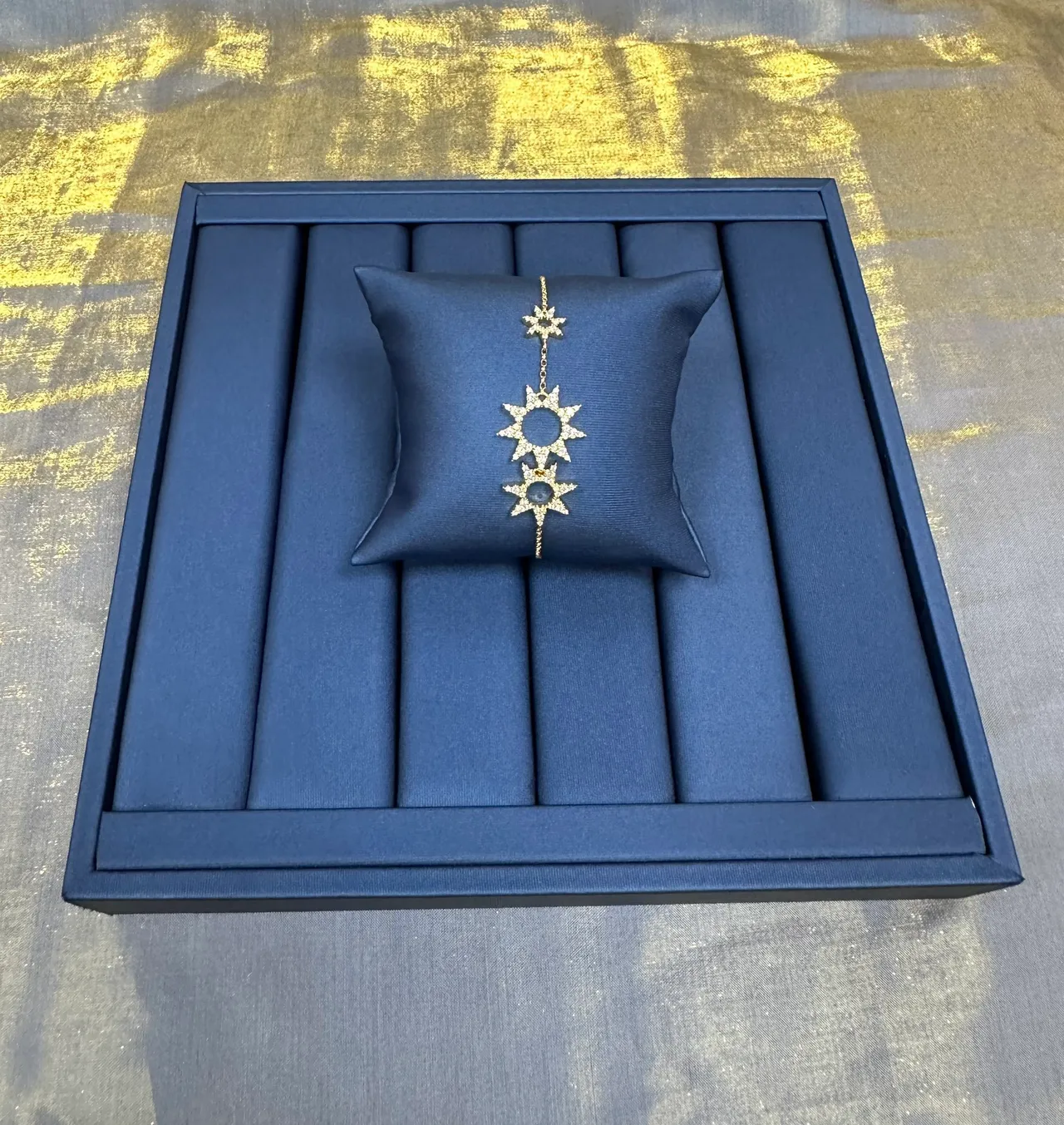 Bracelet en chaîne avec motif étoile éclatante en ton doré 9