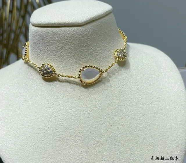 Gold-Tone Three-Link Oval Stone and Crystal Bracelet 7