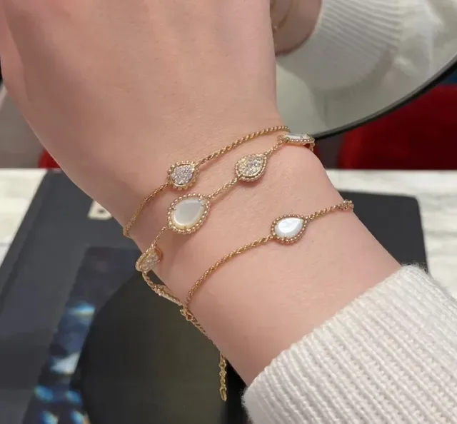 Gold-Tone Three-Link Oval Stone and Crystal Bracelet 8