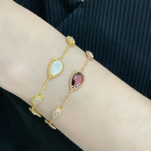 Gold-Tone Three-Link Oval Stone and Crystal Bracelet 9