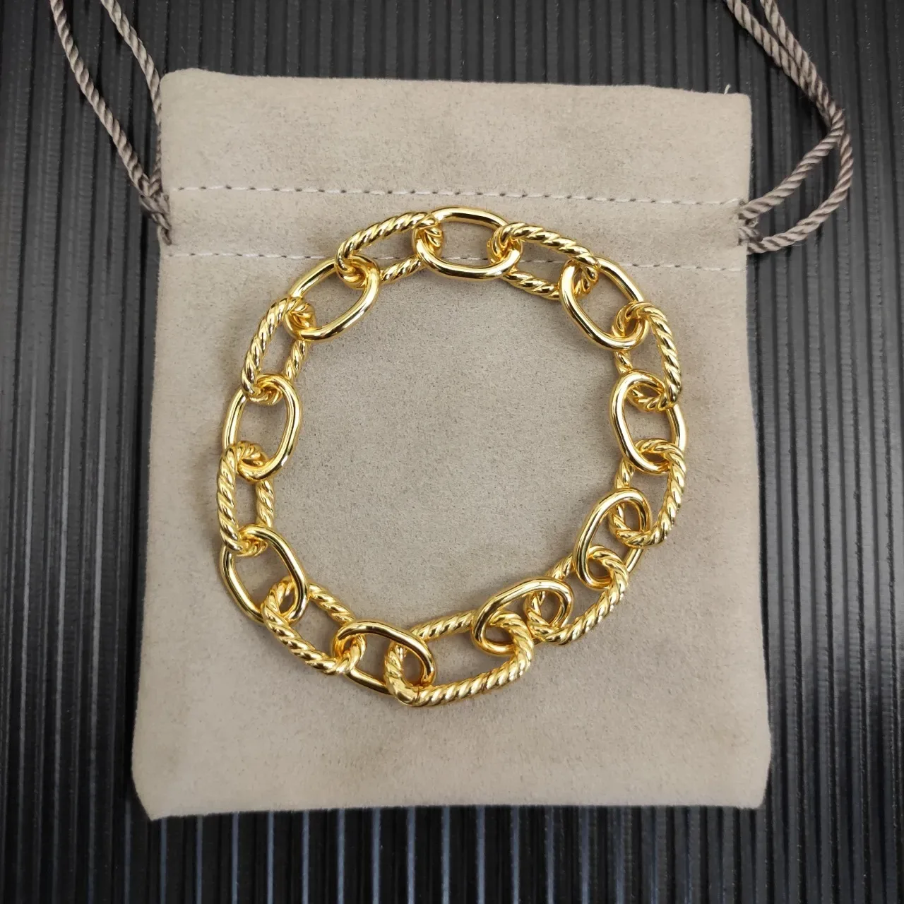 Gold-Tone Twisted Rope and Oval Link Chain Bracelet 8