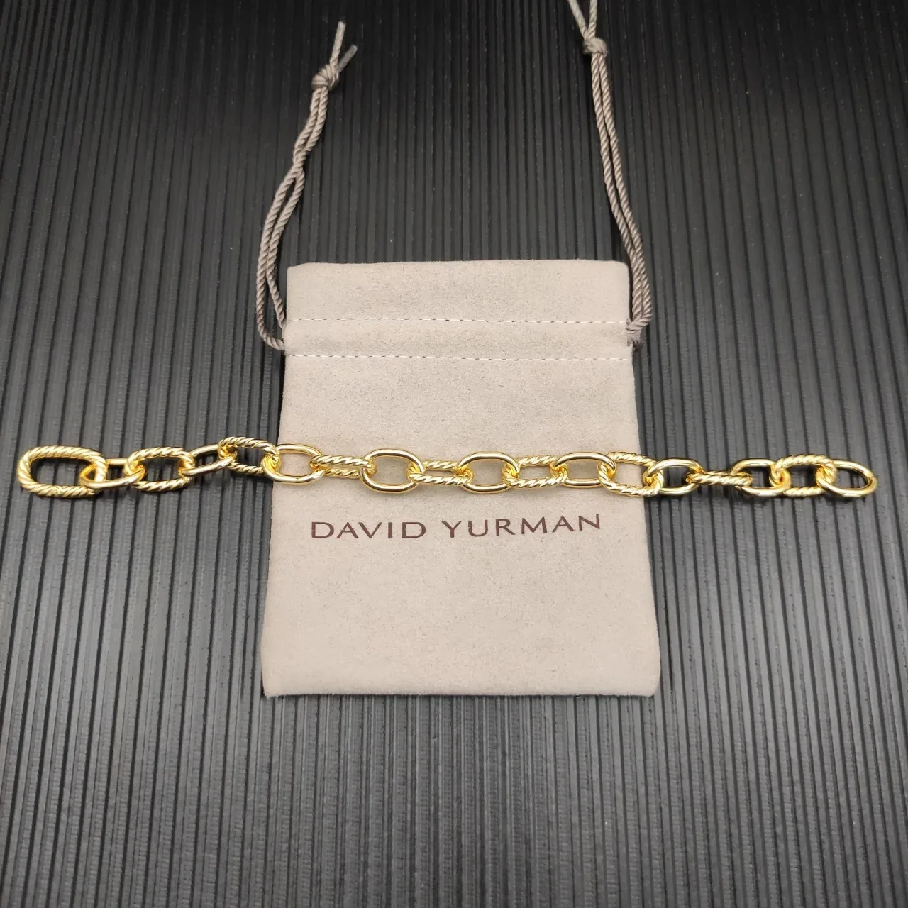 Gold-Tone Twisted Rope and Oval Link Chain Bracelet 9