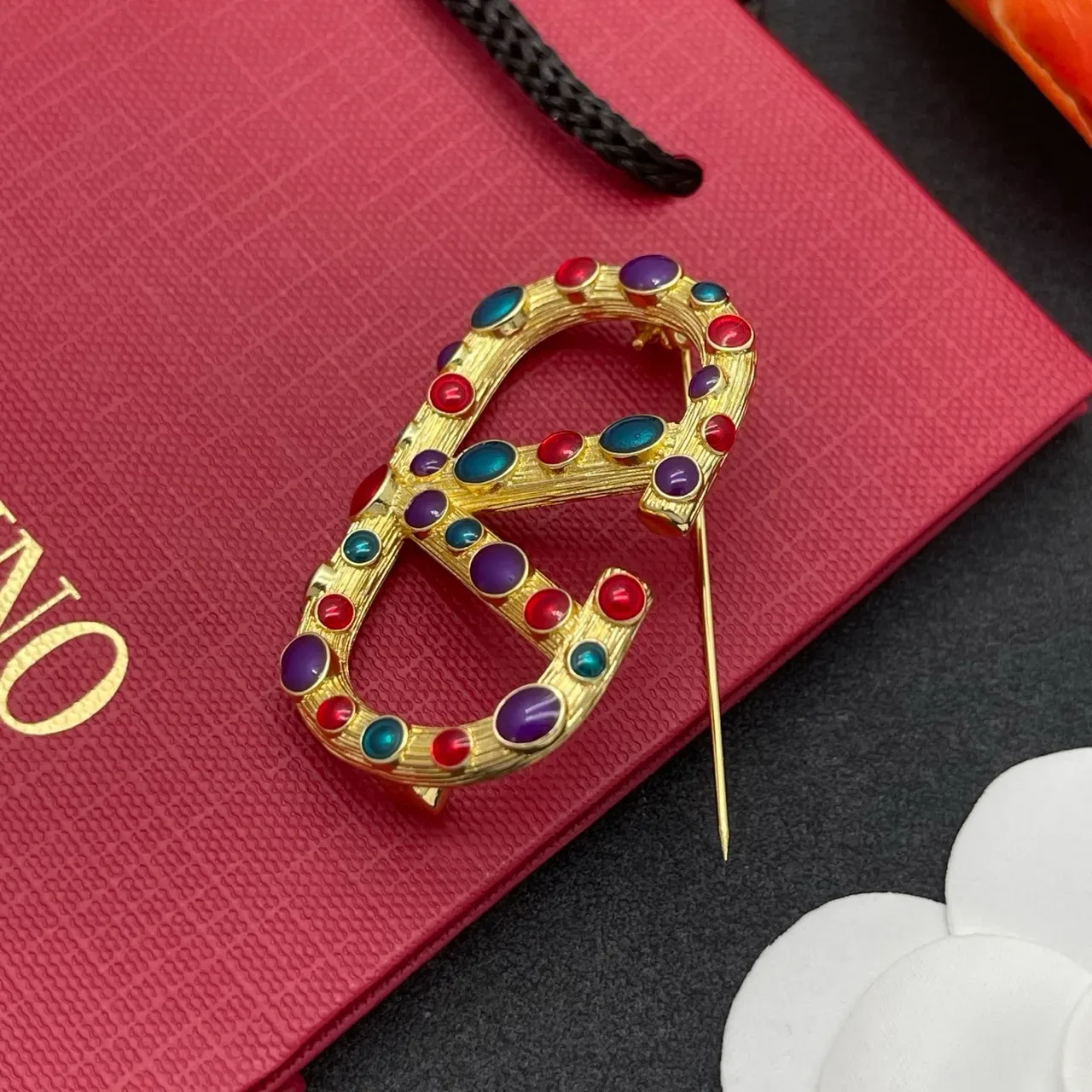Multicolor Cabochon-Studded Interlocking C-D Motif Gold-Tone Brooch 5