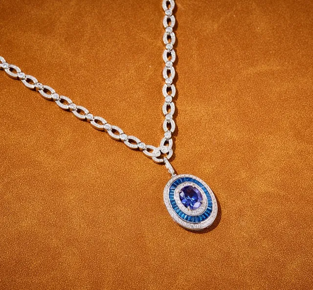 Oval Sapphire and Diamond Halo Pendant Necklace 3