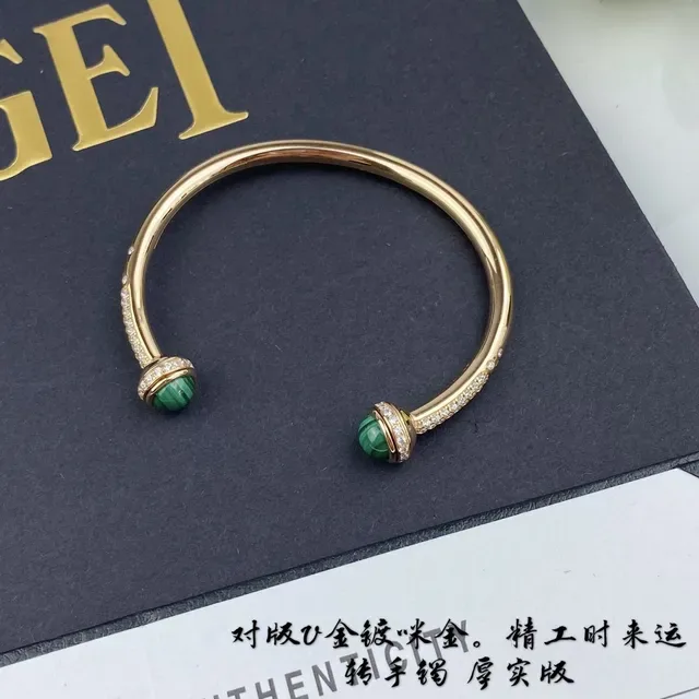 Piaget Possession Gold and Red Cabochon Rotating Cuff Bracelet 7
