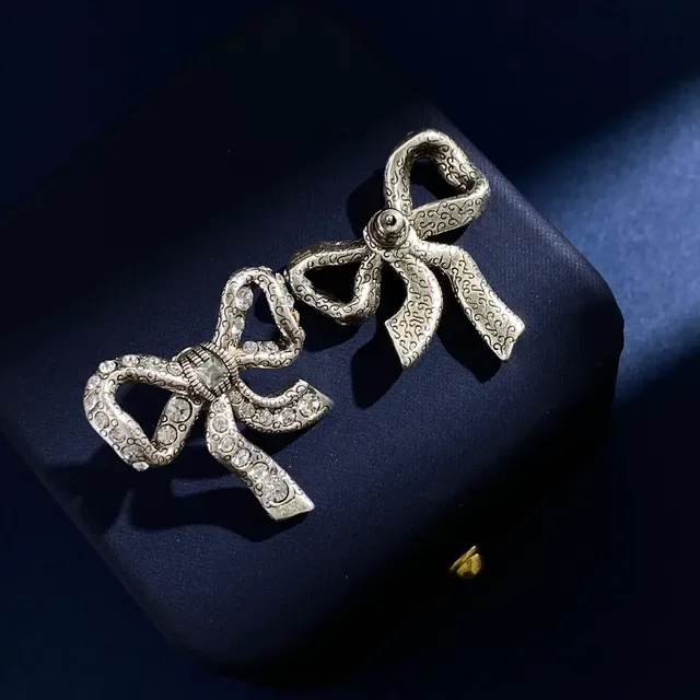Rhinestone-Encrusted Bow-Shaped Antique Silver Earrings 8