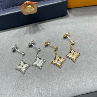 Silver and Gold Tone Star-Pavé Dangling Stud Earrings