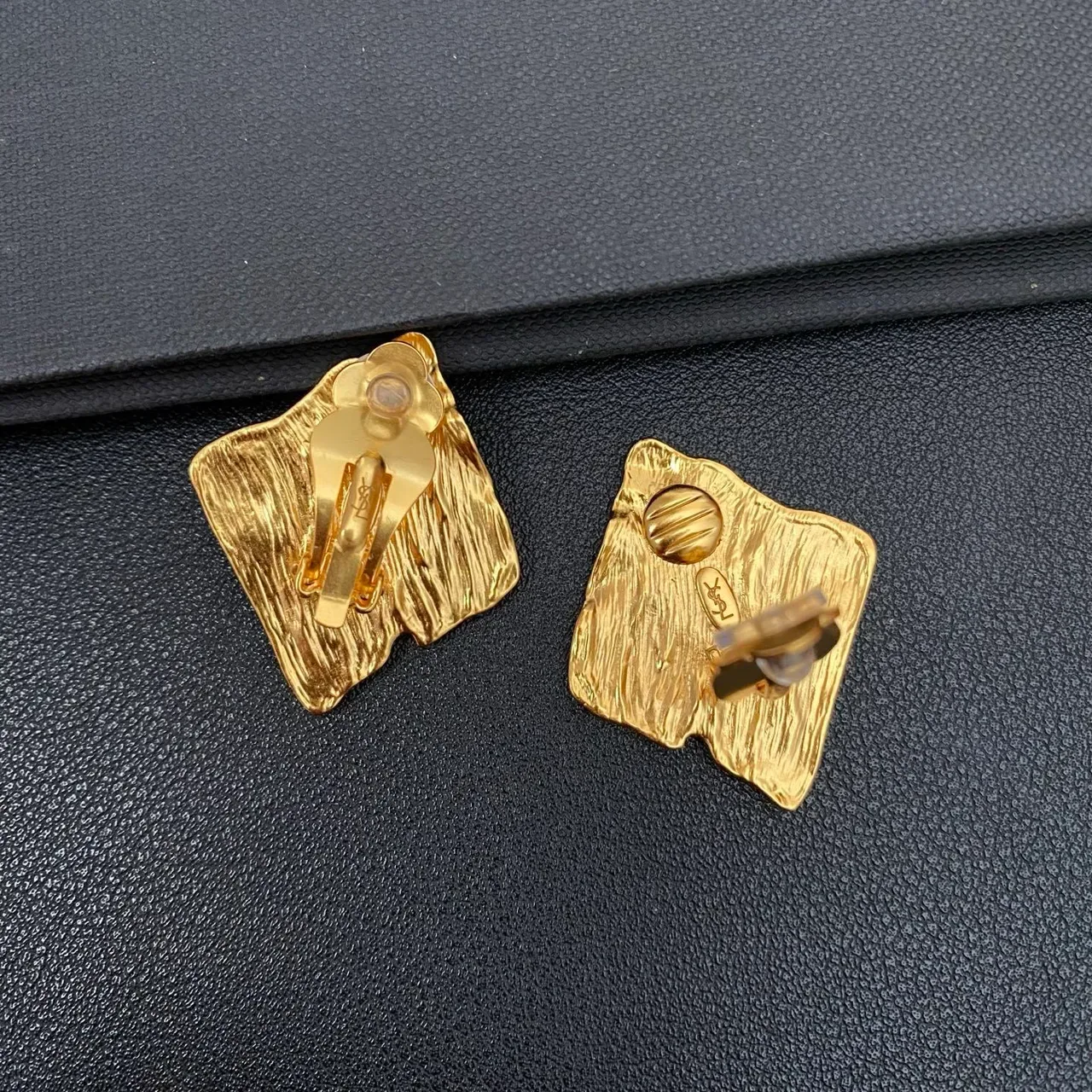 Textured Gold Folded-Book Silhouette Jewelry 3