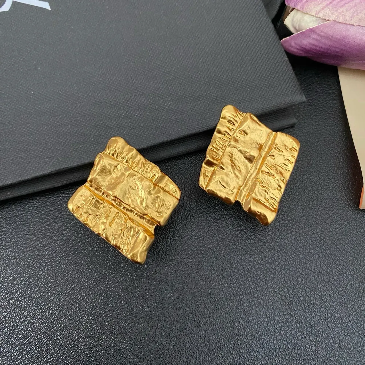 Textured Gold Folded-Book Silhouette Jewelry 7