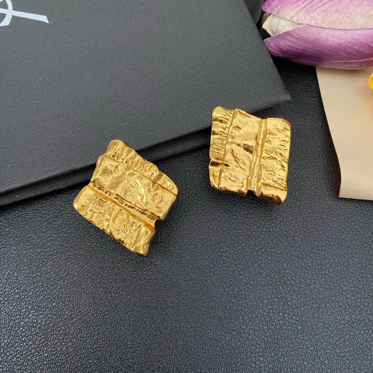 Textured Gold Folded-Book Silhouette Jewelry 8