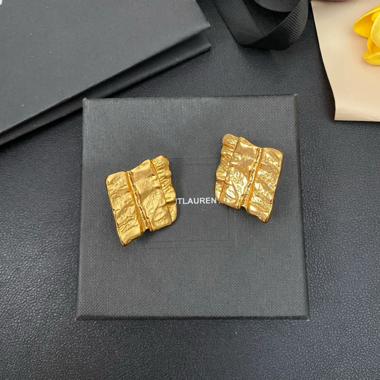 Textured Gold Folded-Book Silhouette Jewelry 9