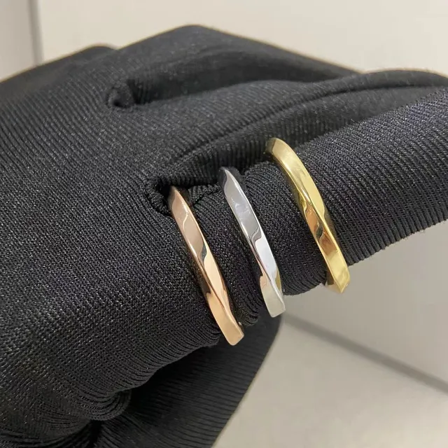 Three-Tone Interlocking Twisted Band Rings 2
