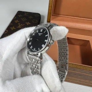 Tissot Everytime काली डायल चांदी टोन क्वार्ट्ज घड़ी