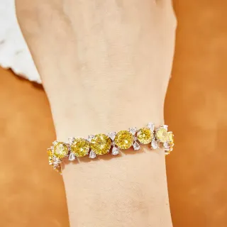 Pulsera de tenis con gemas amarillas y blancas
