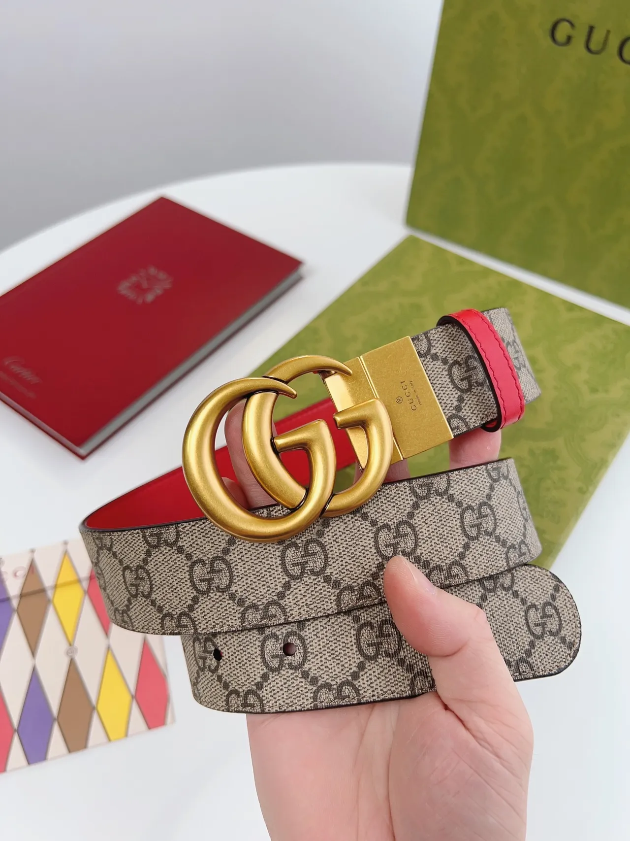 Gucci Double G 红色皮革腰带和 GG Monogram 织带皮革腰带 9