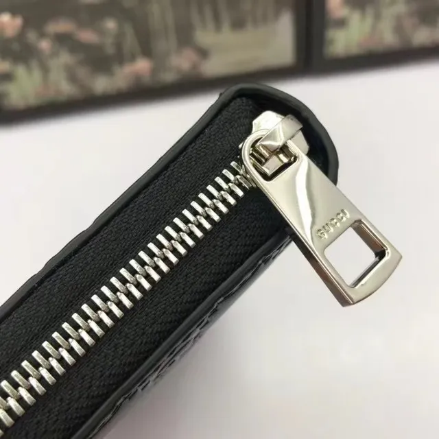 Carteira longa Gucci GG Marmont preta com monograma GG embossado e zíper 4