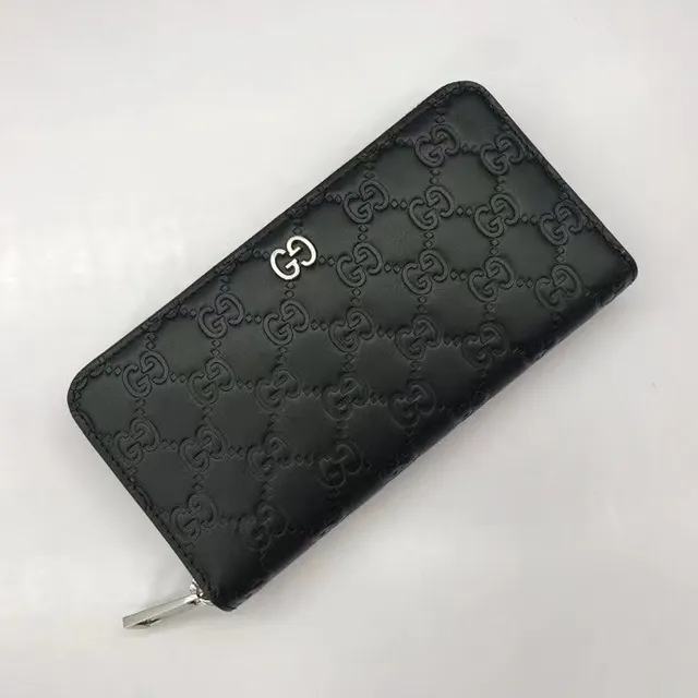 Carteira longa Gucci GG Marmont preta com monograma GG embossado e zíper 5