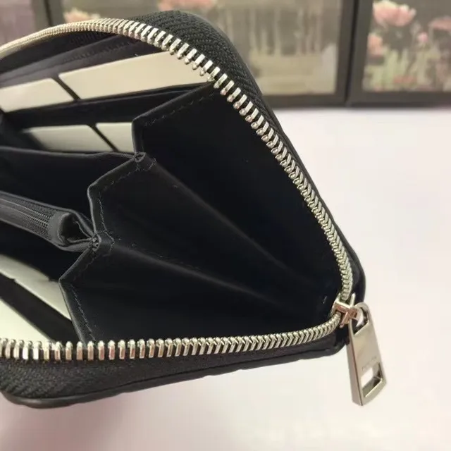 Carteira longa Gucci GG Marmont preta com monograma GG embossado e zíper 7