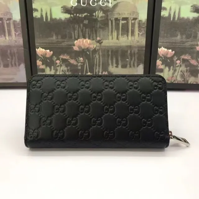 Carteira longa Gucci GG Marmont preta com monograma GG embossado e zíper 9
