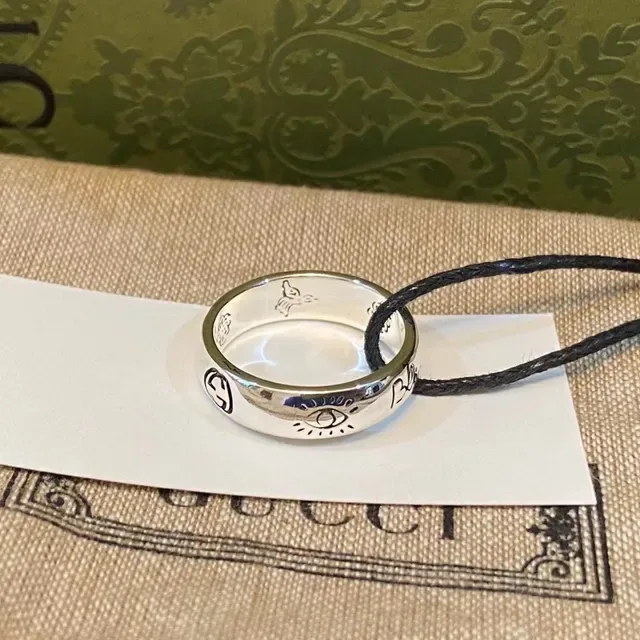 خاتم Gucci GG Marmont فضي أخضر نقش قلب نمط شعار G متشابك 2