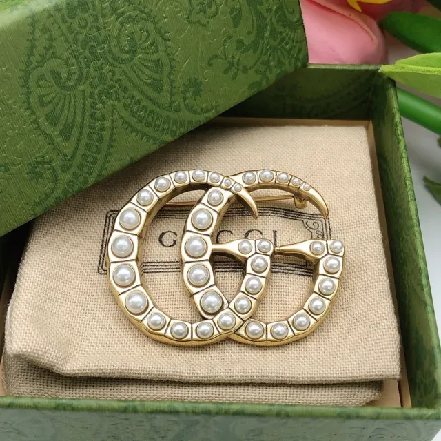 Broche Gucci GG Perles Or Blanc Motif Interlocking G 6