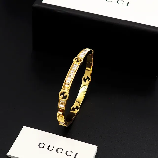Gucci Gold-Tone Baguette Crystal Interlocking G Bangle Bracelet 4