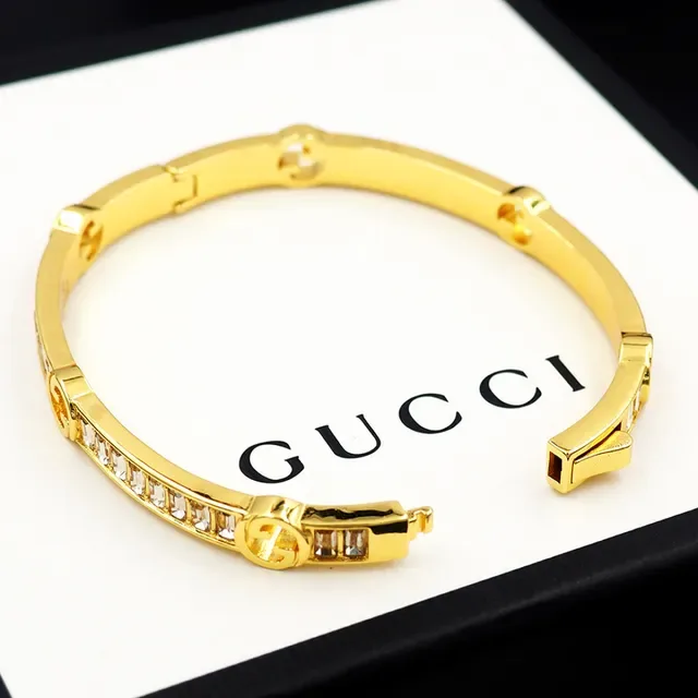 Gucci Gold-Tone Baguette Crystal Interlocking G Bangle Bracelet 6