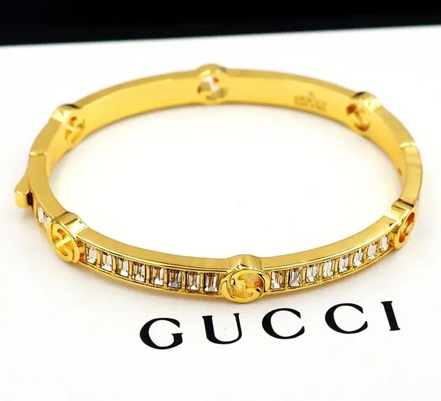 Gucci Gold-Tone Baguette Crystal Interlocking G Bangle Bracelet 7