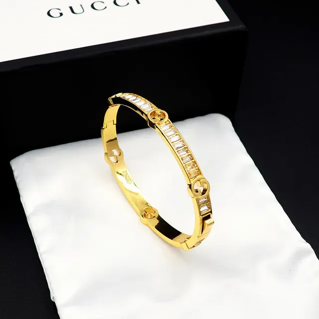 Gucci Gold-Tone Baguette Crystal Interlocking G Bangle Bracelet 8