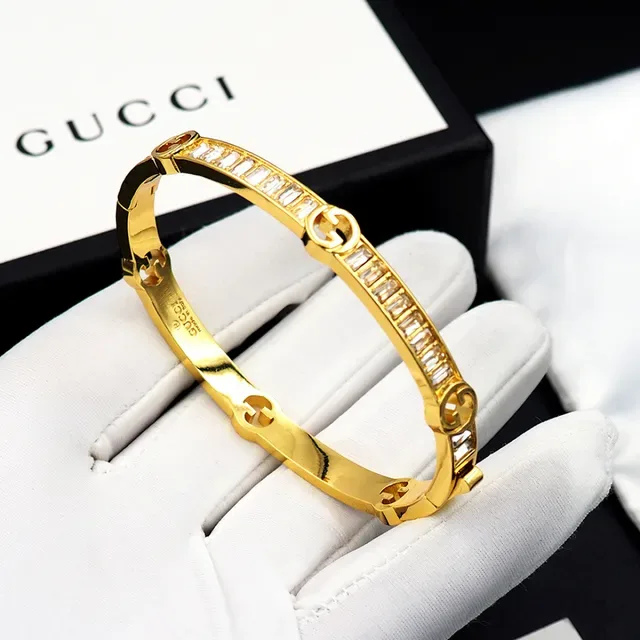 Gucci Gold-Tone Baguette Crystal Interlocking G Bangle Bracelet 9