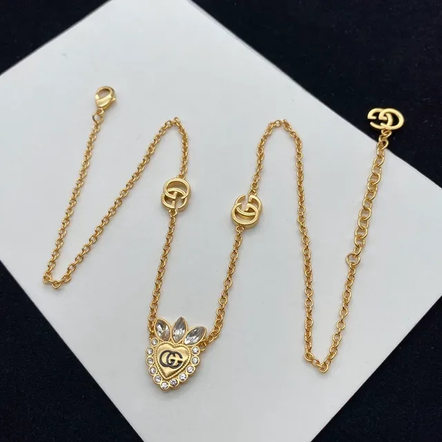 Gucci Gold Transparent Heart Pendant Necklace 5