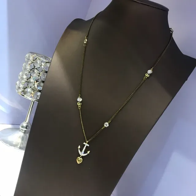 Gucci Chaîne d'Or avec Pendentif Ancre Blanc 3
