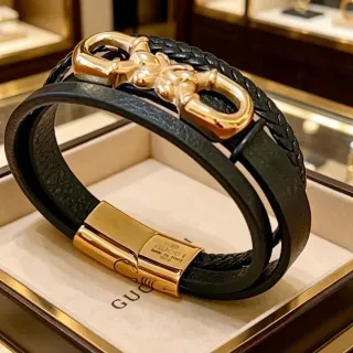 Gucci Horsebit 1955 أسود جلد مضفر ذهبي سوار