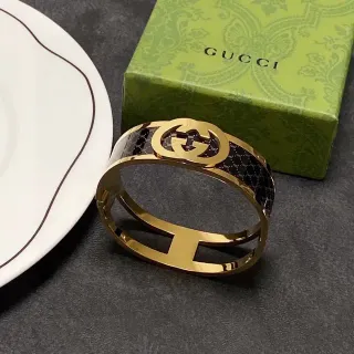 Gucci Interlocking G Black Enamel Gold-Tone Hinged Cuff Bracelet