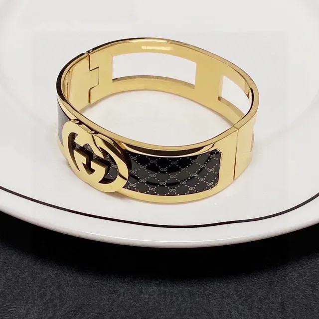 Gucci Interlocking G Black Enamel Gold-Tone Hinged Cuff Bracelet 3