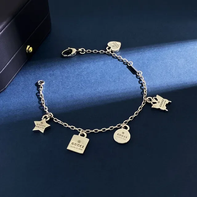 Gucci Multi-Charm Silver-Tone Engraved Logo Bracelet 3