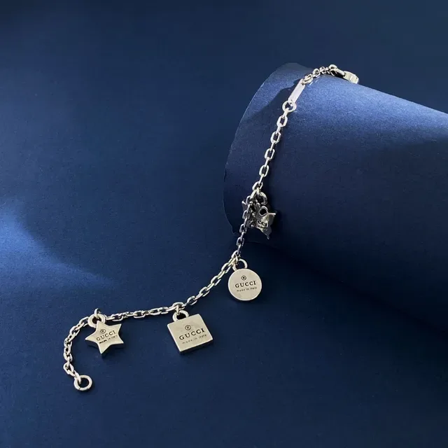 Gucci Multi-Charm Silver-Tone Engraved Logo Bracelet 6