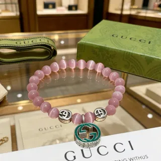Pulsera Gucci de cuentas rosadas y verdes de piedra ojo de gato