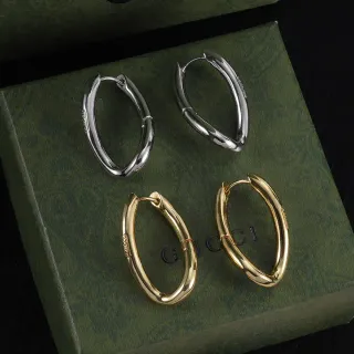 Gucci Silver Gold Oval Hoop Hinged Closure Earrings