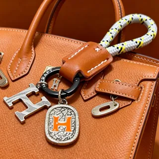 Hermès বাদামী কমলা কাঠামোগত চামড়ার স্যাচেল টপ-হ্যান্ডেল হ্যান্ডব্যাগ