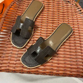 Hermès Oran H-Strap Croc-Embossed Brown Slippers