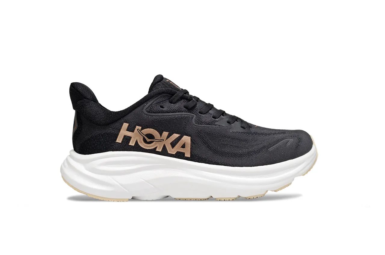 Hoka Chaussures de course avec upper en knit engineered noir et or, midsole sculptée blanche 2
