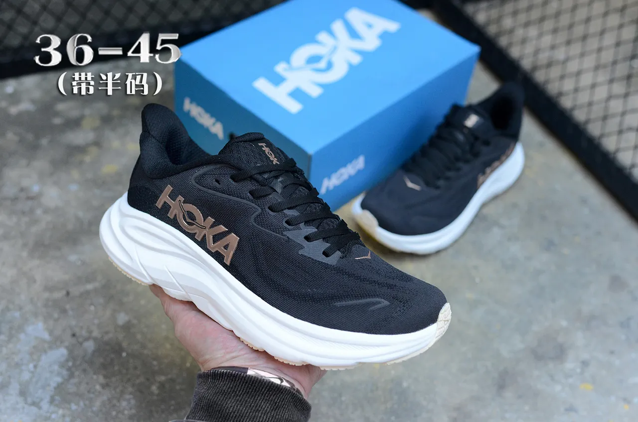 Hoka Chaussures de course avec upper en knit engineered noir et or, midsole sculptée blanche 4