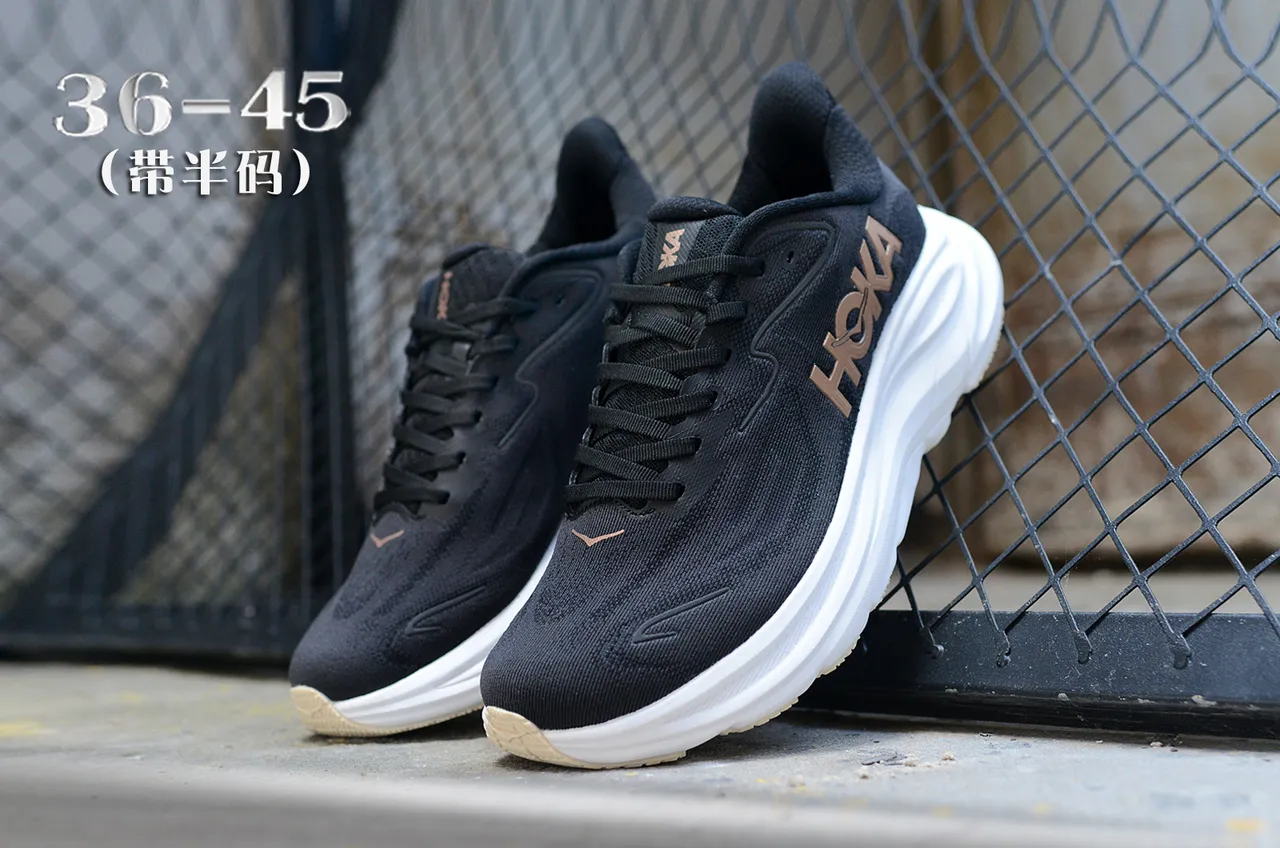 Hoka Chaussures de course avec upper en knit engineered noir et or, midsole sculptée blanche 5