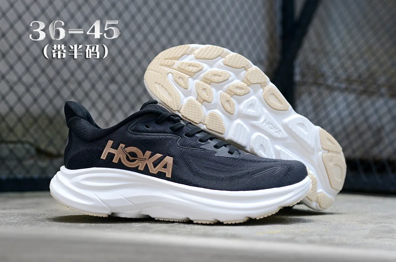 Hoka Chaussures de course avec upper en knit engineered noir et or, midsole sculptée blanche 7