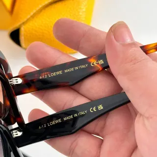 Loeve marrón negro acetato patillas tono dorado grabado gafas de sol